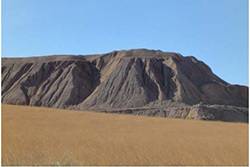 Spent ore from the cyanide heap leaching process formerly used at the Gilt Edge Mine